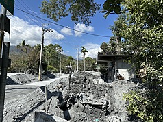 While recovery efforts in the Fata'an barrier lake disaster area are progressing, many problems persist. Five people are still unaccounted for, and many hectares of farmland are covered with meters of sediment.  This photo shows a street in one of the hardest hit areas. (Photo: CNA)