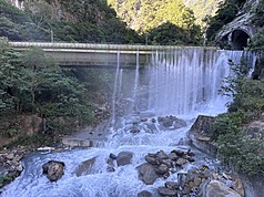 Flooding has covered other roads, forming waterfalls in some locations. (Photo: CNA)