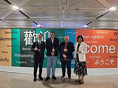 Louis Zabaneh (second from left) and Michel Chebat (second from right) are greeted by Ambassador of Belize Katherine Vanessa Meighan (right) at the airport on Sunday, Oct. 26, 2025. (Photo: CNA)