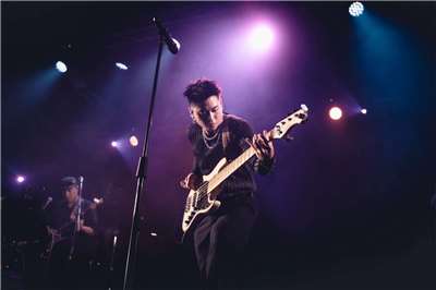 LINION playing bass. (Photo: Provided by LINION) 