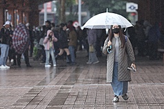 The CWA advises those going out for New Year's Eve events to wear rain gear. (Photo: CNA)
