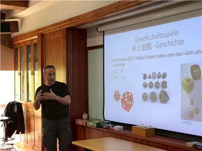 Ilon Huang in class teaching students German words used in tabletop games. (Photo: Ilon Huang)