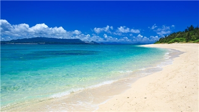 Much of the landscape in the fictional land of "Spira" was inspired by images of the South Pacific, such as the Okinawa beach above! (Photo via Canva)