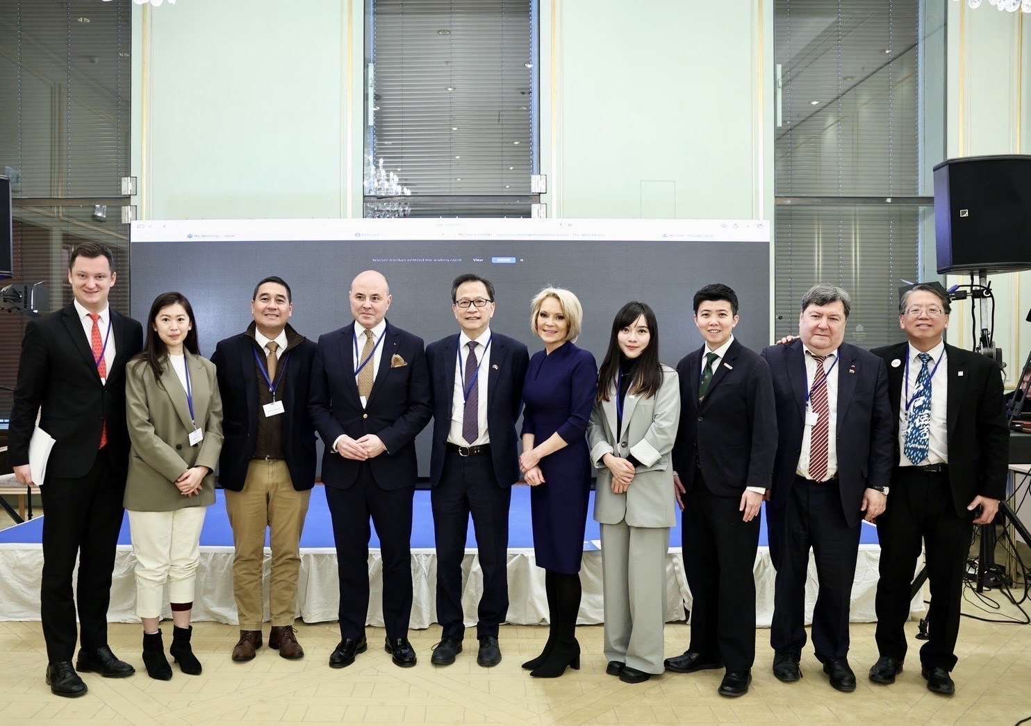 Alexandru Muraru (fourth from left), Klement Gu (fifth from left), Huang Jie (fourth from right), and Miao Poya (third from right) all spoke at the World Forum this Monday, February 16, 2026. (Photo: Taipei Economic and Cultural Office in Germany)