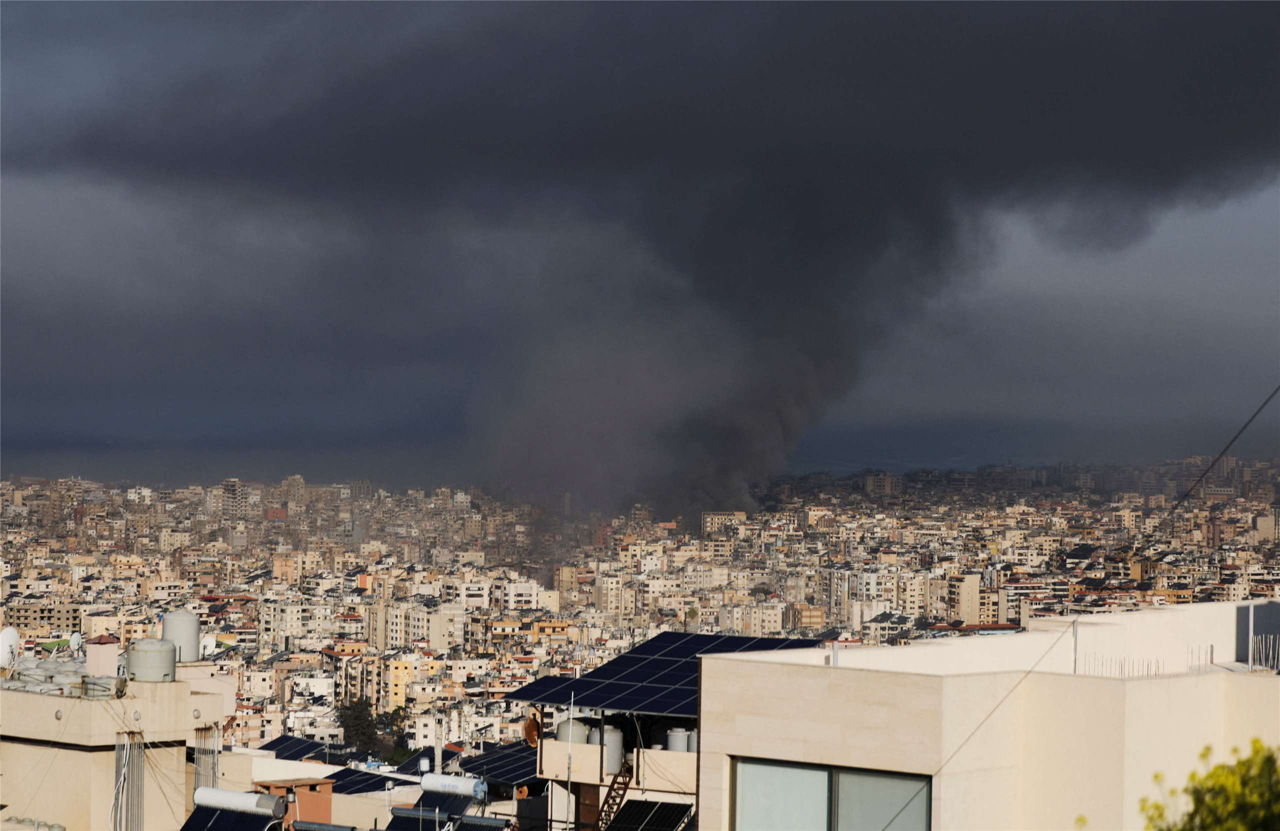 Thick smoke rising after an Israeli airstrike on Beirut's southern outskirts.