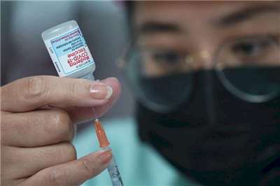 Huang also pointed out that only a completely sealed N95-grade mask can prevent airborne diseases, but this is impractical. Therefore, he recommends that people get vaccinated against measles to develop antibodies. (Photo: CNA)