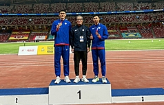 Taiwanese sprinter Chen Wen-pu (left) won gold in the 100m final at the Singapore Open Track and Field Championships on Wednesday, breaking the meet record with a time of 10.26 seconds. His teammate Lai Po-hsiang (right) took bronze with a time of 10.50 seconds. (Photo: CNA)