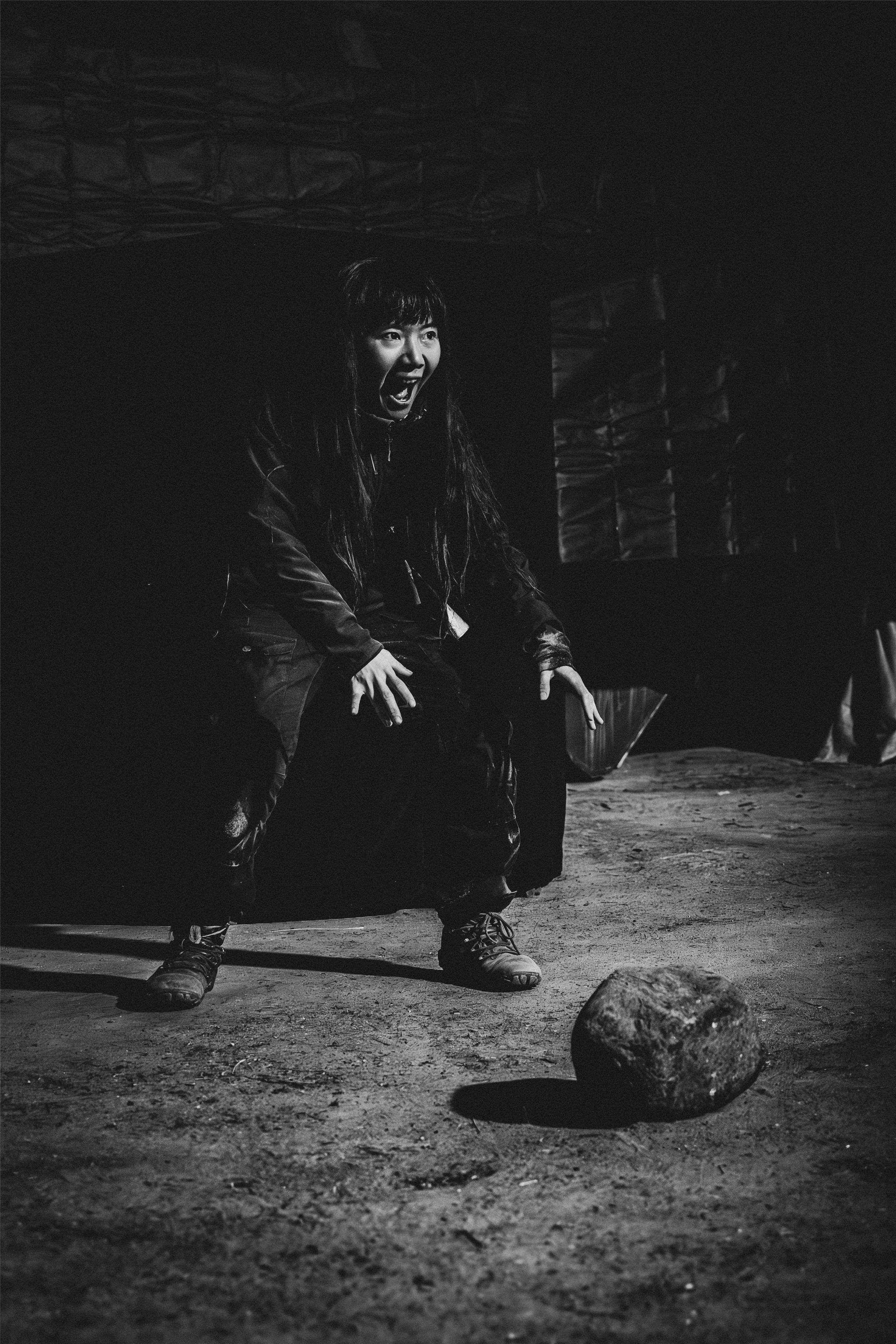 Hui Tsyr with a stone she found by the fireplace in the garden where she rehearses for performances at Teater Albatross, the theater where she lives in Gunnarp, Sweden. (Photo provided by Hui Tsyr)