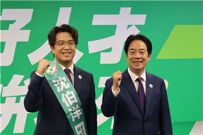 DPP legislator Puma Shen (left) and party leader Lai Ching-te pose at a press conference in Taipei on May 13 announcing Shen as the DPP’s candidate in the city’s November mayoral election. (Rti Photo/James Thompson)