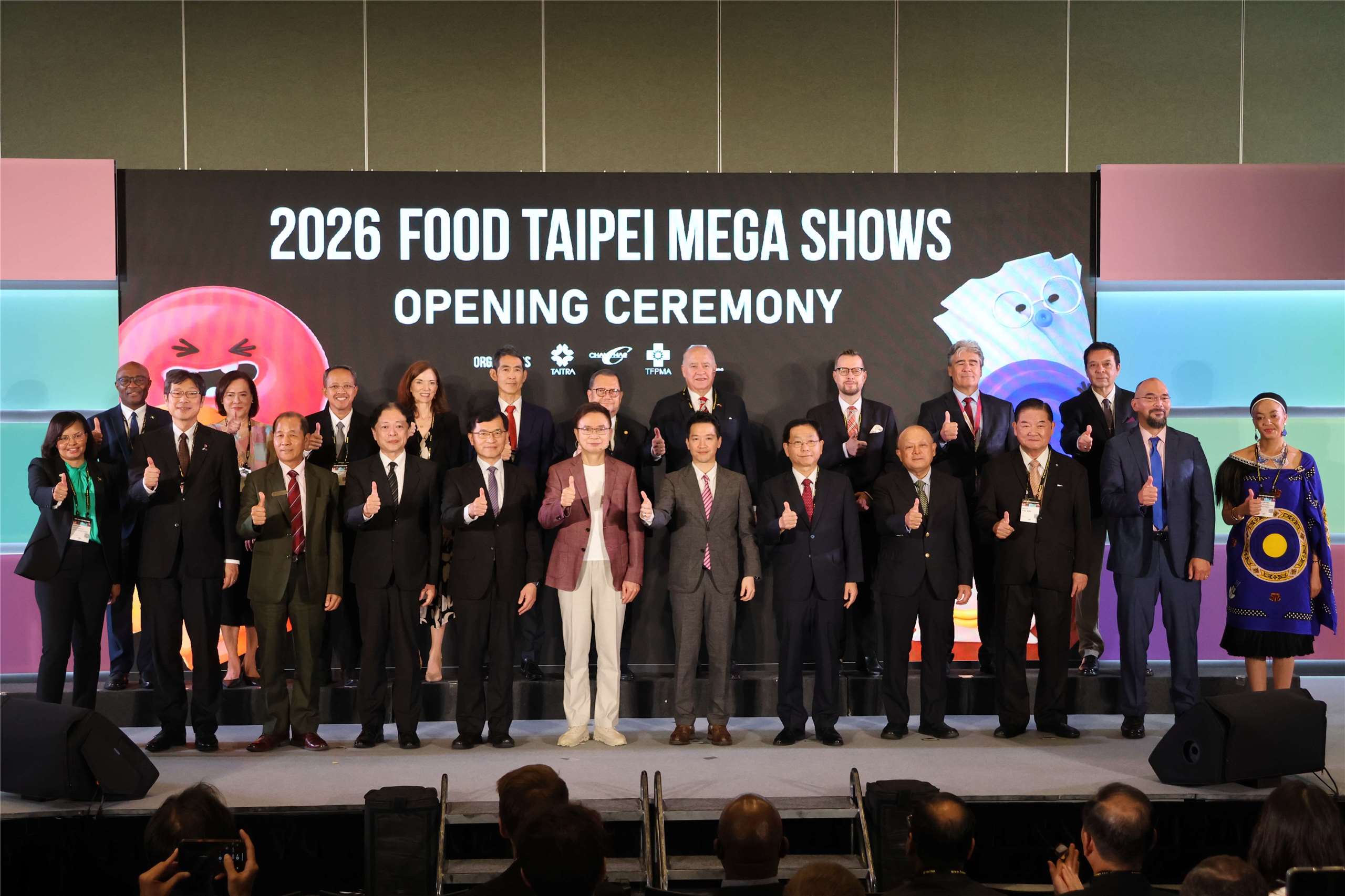 Organizers and distinguished guests pose for a group photograph at the Food Taipei Mega Shows 2026 opening ceremony on June 24, 2026. (Rti Photo/James Thompson)