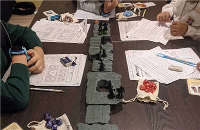 Teaching children how to play D&D! (Photo: Brian and Daisy)