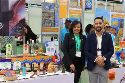 Belize Ambassador to Taiwan Katherine Meighan, front left, and Beltraide senior advisor Omar Castillo, front right, at the Food Taipei Mega Shows 2026 Belize exhibition area in Taipei on June 24, 2026. (Rti Photo/James Thompson)