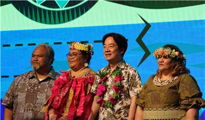 From left to right: Palau Chargé d’Affaires David Adams Orrukem, Tuvalu Ambassador Lily Tangisia Faavae, Taiwan President Lai Ching-te and Marshall Islands Ambassador Anjanette Kattil stand together for a photo at the Pacific Cultural Gala in Taipei on June 5, 2026. (Rti Photo/James Thompson)