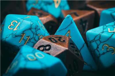 Dice are sometimes needed, sometimes not! (Photo: Timothy Dykes via Unsplash)