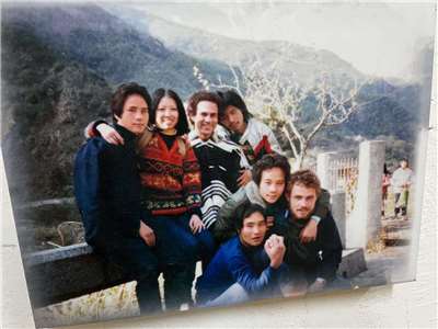 A photo on the wall in Sanmao's dreamhouse in Wufeng, Taiwan. The picture shows Sanmao (second, left) alongside some friends from her youth. (Photo: Jacob Kushner)