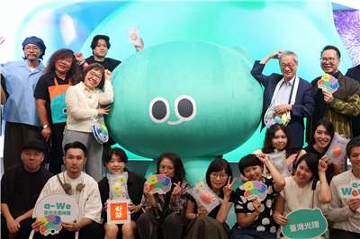 Culture Minister Li Yuan, designer Fang Hsu-chung, and other event attendees pose with a-We in Taipei on September 1, 2026. (Rti Photo/James Thompson)