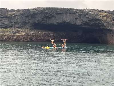 A picture of people on SUPs