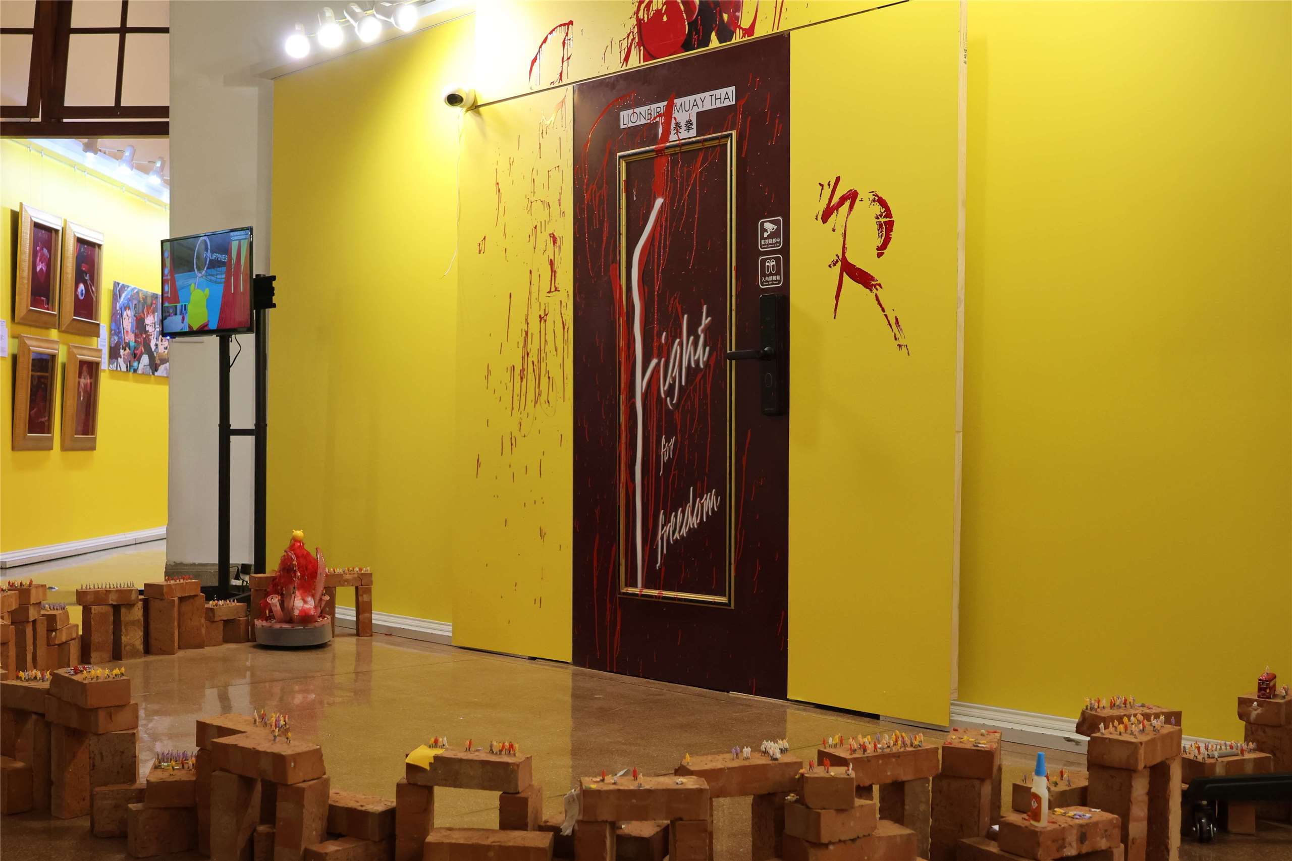 Artwork is displayed at the third Hong Kong Human Rights Art Exhibition in Taipei on June 10, 2026. (Rti Photo/James Thompson)
