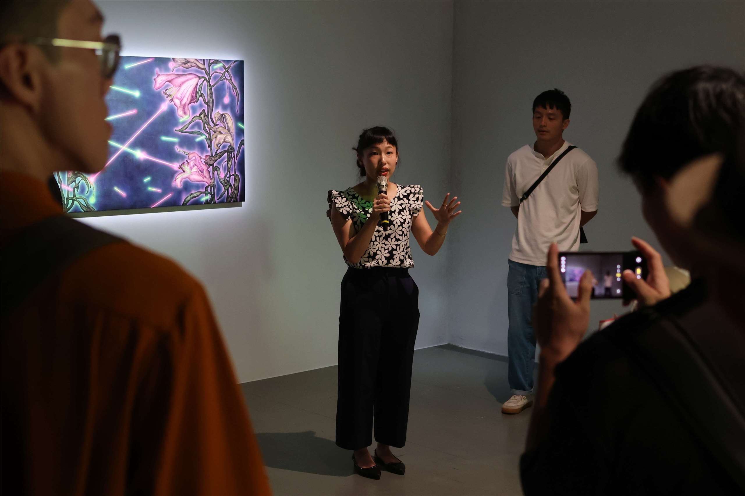 Curator Christina Chen introduces the “Weeds Don’t Obey” exhibition at the Museum of Contemporary Art in Taipei on July 16, 2026. (Rti Photo/James Thompson)
