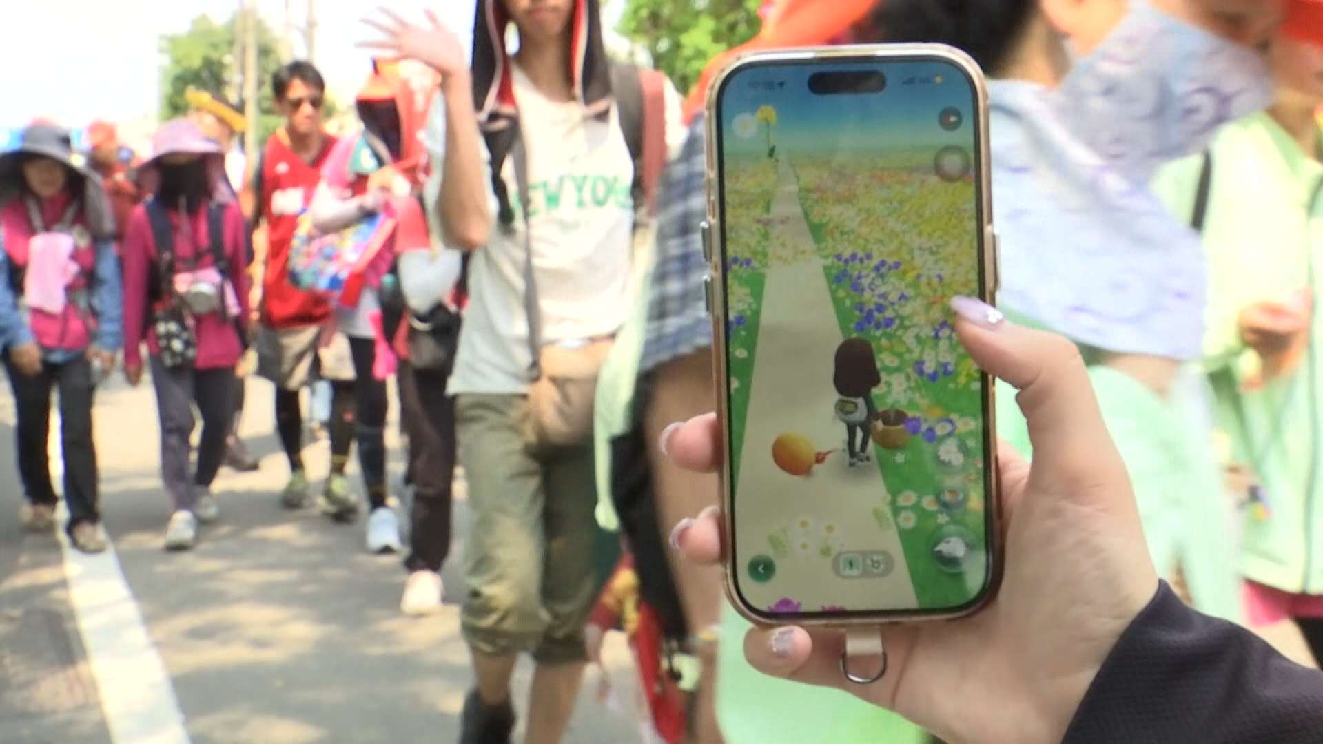 Aplicación Pimkie Bloom en la procesión de Mazu de Baishatun (Foto: captura de vídeo)