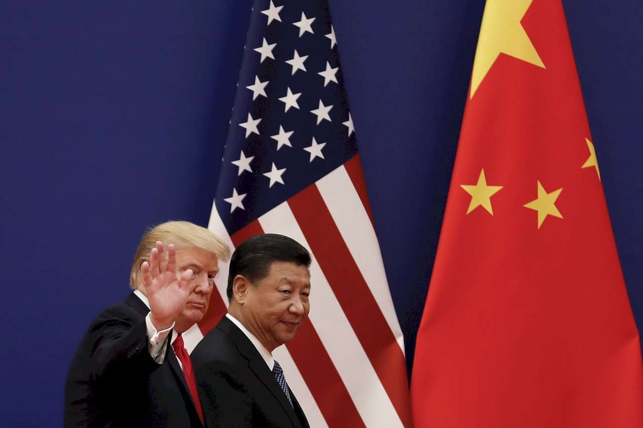 Donald Trump et Xi Jinping (image AP/Shutterstock)