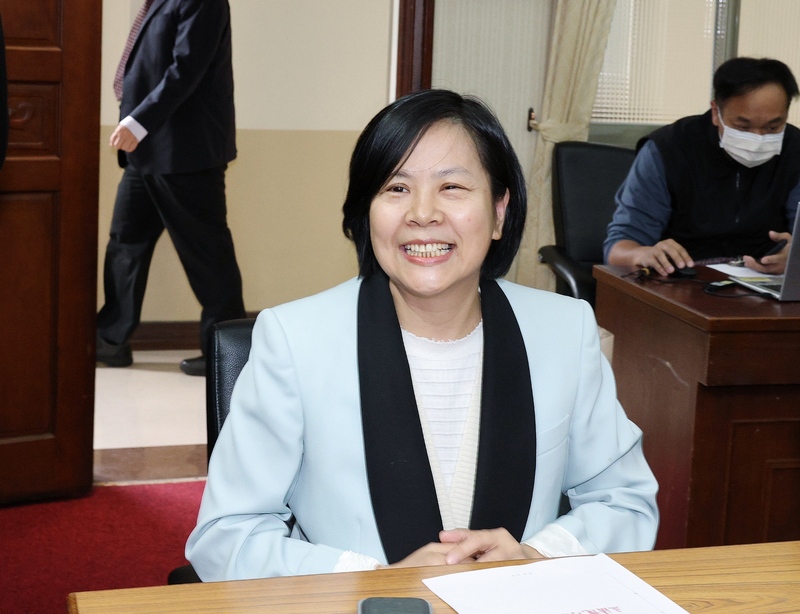 Li Zhenxiu était présente ce matin au Parlement lors du débat sur sa nationalité et son éligibilité (photo CNA)