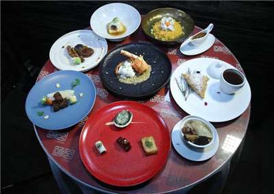 Menu "trois étoles" du restaurant étoilé "Palais de Chine" (Photo CNA)