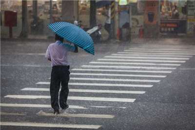 Hujan. (Foto: CNA)