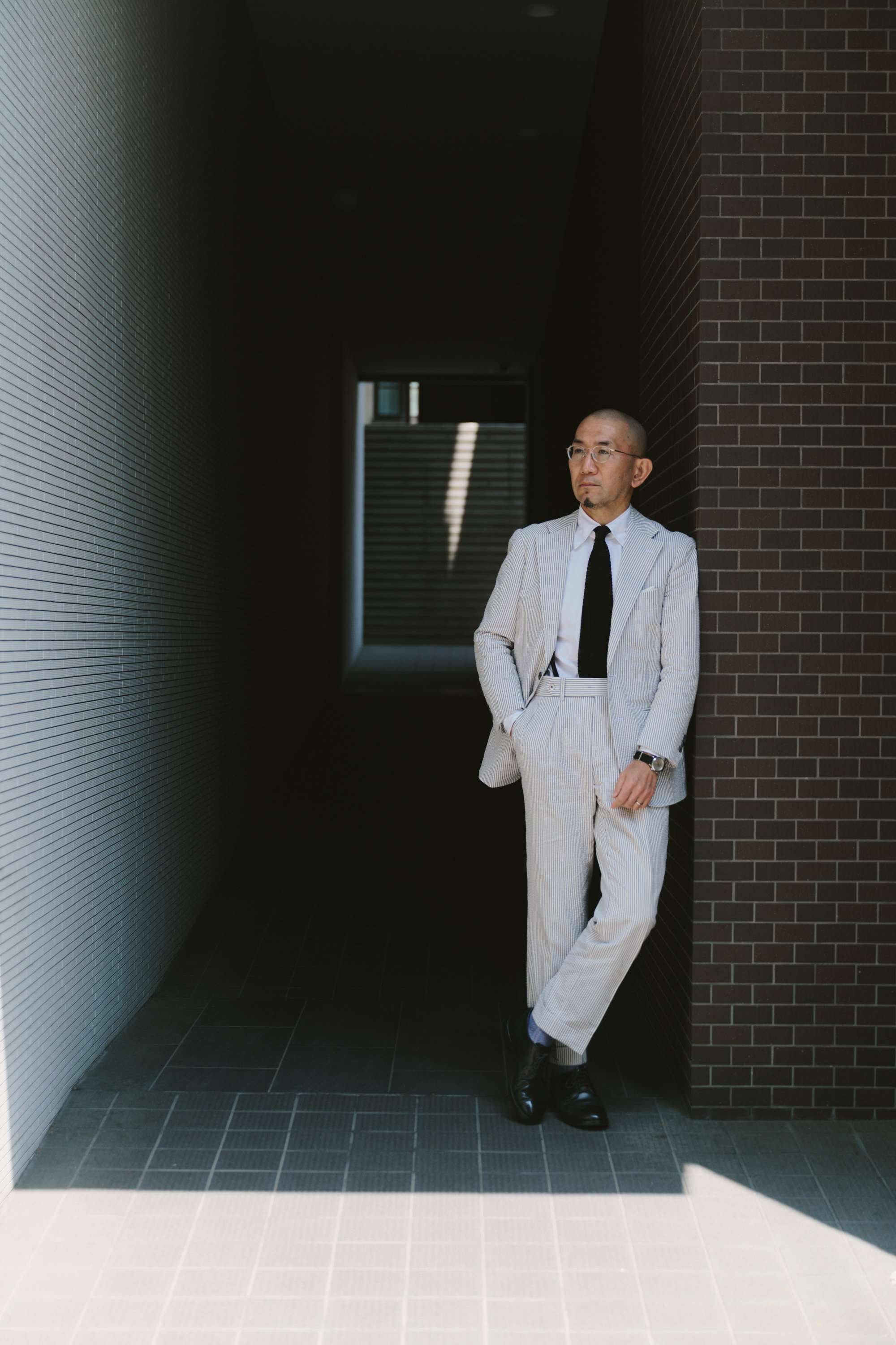 1954に設立されたスーツブランドRINGJACKETのWHOLESALE Div. MANAGERである笹本英利さんです。（写真：OakRoom） 