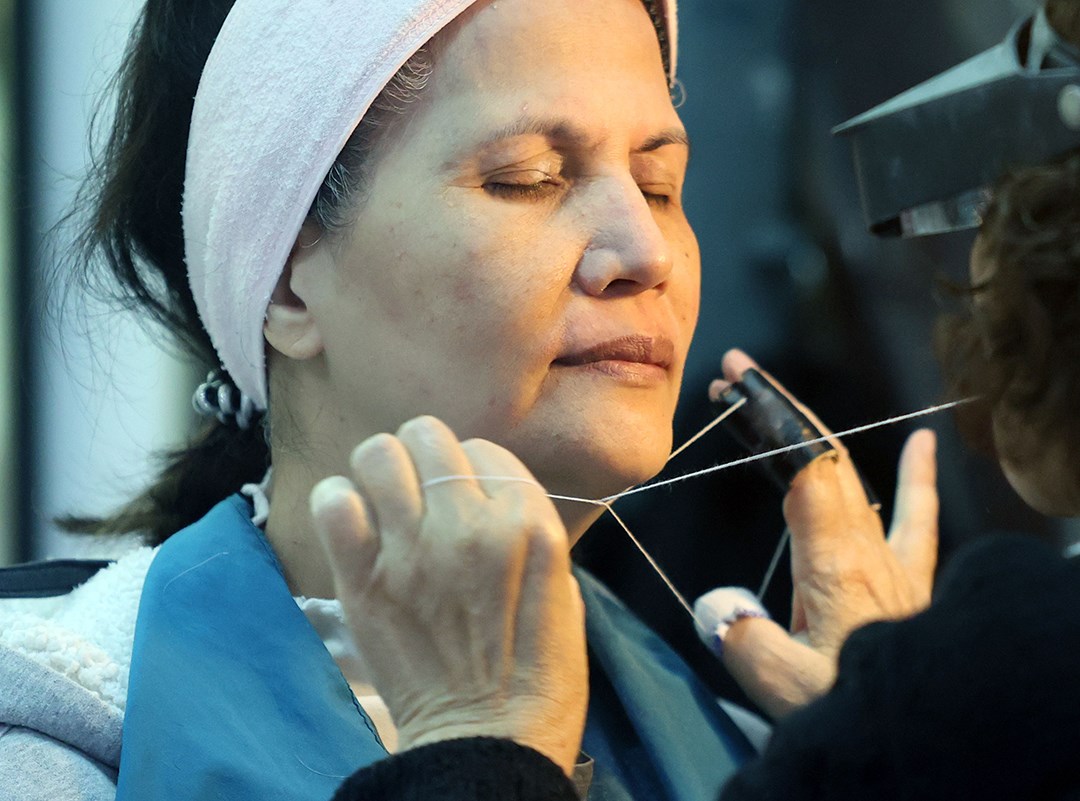 Facial threading, photo from CNA