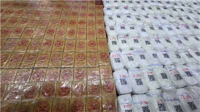Sa press conference, ipinakita ang nakumpiskang 281 kilo ng heroin bricks at malaking halaga ng ketamine. Kuha ni Liu Yu-chiu.
