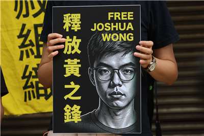 Iniulat ng Agence France-Presse noong ika-2 na umamin si Wong sa kasong conspiracy to collude with foreign forces sa ikalawang national security trial laban sa kanya, at maaari siyang maharap sa habang-buhay na pagkakakulong. (Rti Photo/James Thompson)