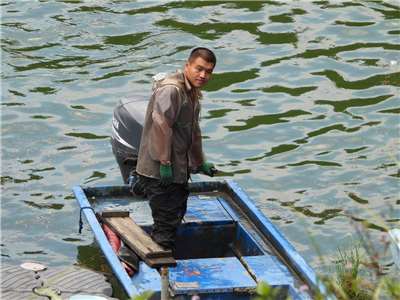 廖文翔是石門水庫少數擁有捕魚執照的漁師（廖文翔提供）