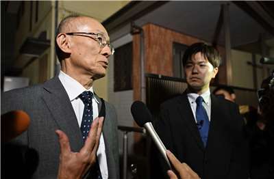 日本名古屋主婦高羽奈美子26年前在自宅遭到殺害，案發公寓在丈夫高羽悟(圖左)的堅持下持續支付租金，終於破案，高羽悟出面說明26年來心路歷程。(AFP)