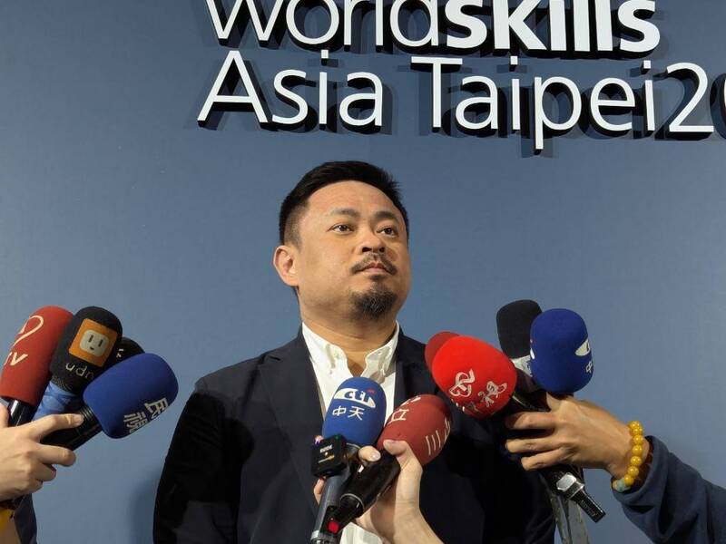 勞動部部長洪申翰。資料照。