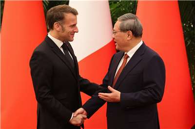 法國總統馬克宏4日下午在北京會見中國國務院總理李強。