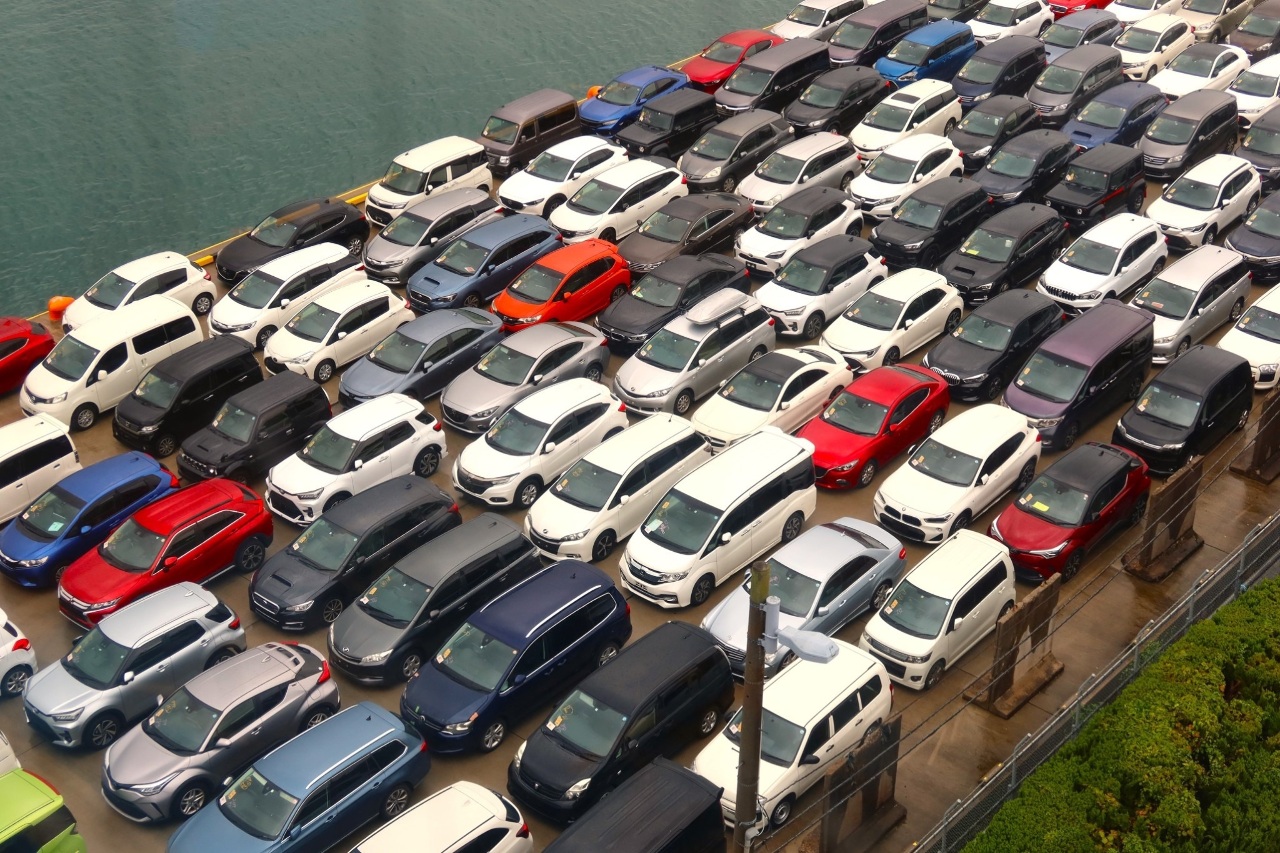 川普簽署行政命令，對日汽車關稅不疊加降至15%。汽車示意圖，攝於日本富山港。(圖：沈聰榮)