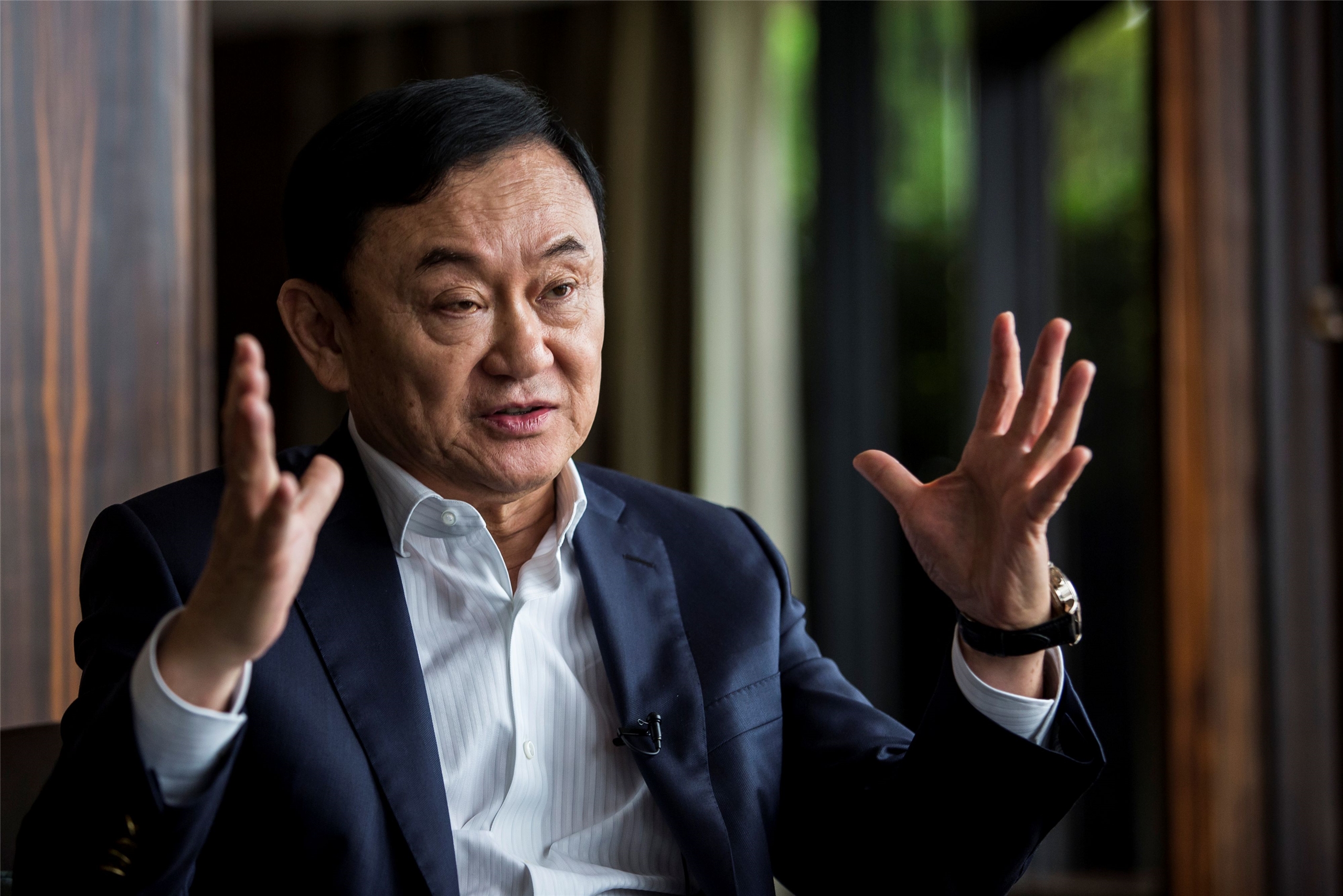 泰國前總理戴克辛(Thaksin Shinawatra)4日出人意料之外地突然離開泰國，法院可能在5天後做出讓他再度入獄的判決。資料照。(AFP)