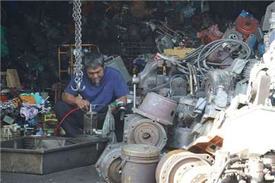 圖為馬達製造業者作業情形。資料照。