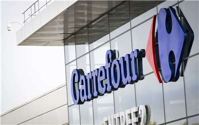 法國零售巨擘家樂福(Carrefour)宣布，受到法國示威活動演變成暴力打劫等衝突事件衝擊，下修今年財測。(AFP)
