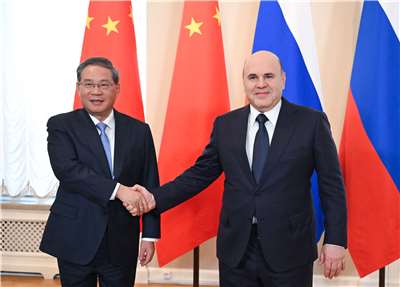 中國國務院總理李強(左)21日上午在俄羅斯聖彼得堡與俄羅斯總理米舒斯京(右)舉行中俄總理定期會晤。