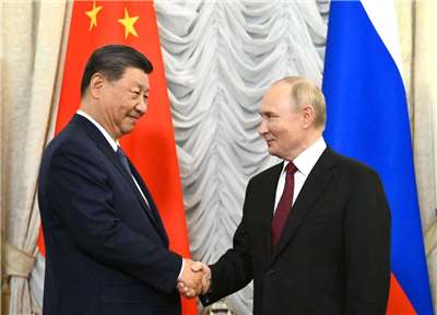 中國國家主席習近平(左)與俄羅斯總統普丁(右)。(圖：克宮)