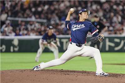 世界棒球經典賽C組預賽今天(9日)由韓國對上澳洲，圖為韓國投手朴英賢。(AFP)