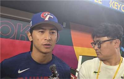 台灣隊5日對澳洲之戰中，陳傑憲遭觸身球擊中手指，談到受傷當下的心情，陳傑憲坦言自己確實很不甘心。(江昭倫 攝)