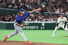 世界棒球經典賽（WBC）C組預賽台灣隊7日在日本東京巨蛋與捷克隊交手，台灣隊投手林昱珉在第3局中繼登板，順利化解壘上有人危機。