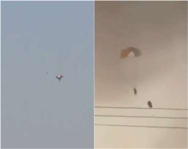 科威特當地民眾與媒體目擊美國軍機起火墜毀，飛行員跳傘逃生。(X平台/@HotBeatNews)