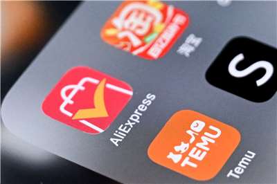 中國公布對台十項措施中，聲稱要設對台小額商品交易市場讓台灣中小微企業開拓對岸市場。但學者分析，中國市場正在低價競爭，尤其是其電商平台更是低價競爭元凶，甚至影響台灣微型企業，如何有說服力支持台灣小商家?圖為中國電商平台。 (AFP)