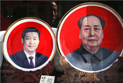 已故中共領導人毛澤東、中共領導人習近平。(美聯社/達志影像)