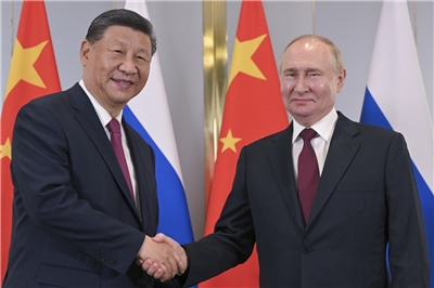 俄羅斯總統普丁（右）將於19至20日對中國國是訪問，中國國家主席習近平（左）表示，中俄各領域合作不斷走深走實，取得豐碩成果。資料照。(美聯社/達志影像)