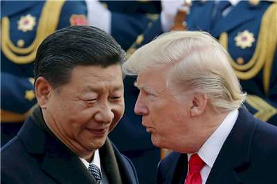 美國總統川普(右)預計13日到15日訪問中國，14日與中國國家主席習近平(左)會面。資料照。